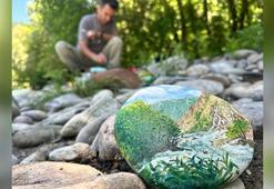 Munzur Vadisi’nden özenle topladığı taşlar, tuvali oldu