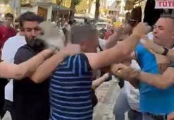 Boşanan çift ile yakınları arasındaki kavga kamerada