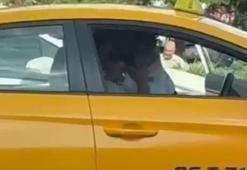 Trafikte tartıştığı taksi şoförünü yumrukladı; o anlar kamerada