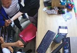 Oğluyla tartışan 2 çocuğu markette darbetti