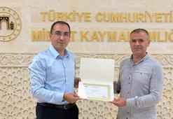 Midyat Kaymakamı Özdemir'den DHA muhabirine teşekkür belgesi