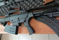 Evinden keskin nişancı tüfeği ve silahlar çıktı; serbest bırakıldı