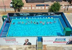 Kırsaldaki çocuklara portatif yüzme havuzu