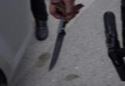 Tartıştığı eşini bıçakla ağır yaraladı