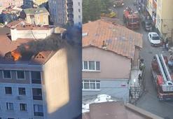Kağıthane'de çatı yangınını söndüren itfaiyeye polis de yardım etti