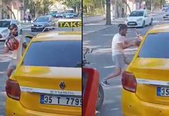 İzmir'de trafikte kasklı, tekmeli ve yumruklu kavga kamerada