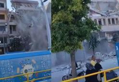 Zeytinburnu'nda kontrollü yıkım sırasında caddeden geçenler kıl payı kurtuldu