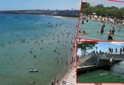 Sıcak havayı fırsat bilenler Menekşe Plajı'na akın etti