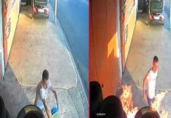 İş yerinin önündeki araç lastiklerini ateşe verdi; o anlar kamerada
