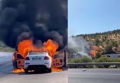 İzmir'de otomobilde çıkan yangın, makilik alana sıçradı