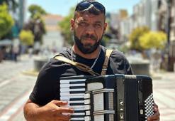 Sokak müzisyeninden ‘Gölgede bile pişiyorum’ şarkısı