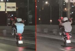 Haliç Köprüsü’nde motosiklet sürücüsünün tek teker üzerinde tehlikeli yolculuğu kamerada