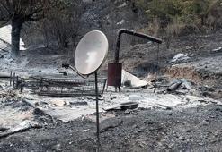 Yanan dağ evinden geriye çanak anten ile soba kaldı