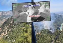 Adana'da orman yangını çıkaran şüphelilerin yakalandığı anlar kamerada