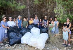 Otizmli çocuklardan yangına karşı orman temizliği