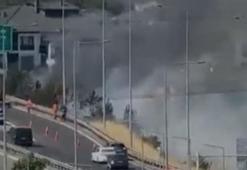 Otoyol kenarındaki ot yangını büyümeden söndürüldü