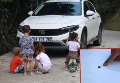 Yorgun mermi kaputa isabet etti; çocuklar kıl payı kurtuldu