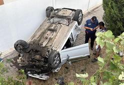 Kaza sonrası savrulan otomobil apartman bahçesine düştü: 3 yaralı