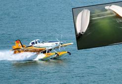 Burdur'da eğitim uçağı, yangın tatbikatı sırasında gölden su alırken kaza kırıma uğradı