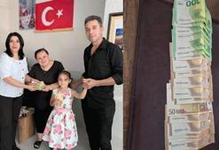 8 yaşındaki Nida Nur, bulduğu içinde 1700 avro olan cüzdanı sahibine teslim etti