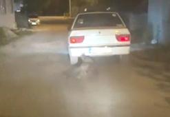 Yaban domuzunu otomobilin arkasına bağlayıp sürükledi