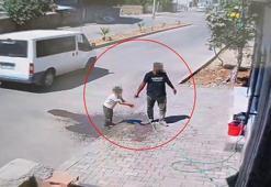 Oğluna hırsızlık yaptırdığı anlar kamerada
