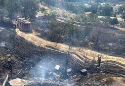 Ot yangınında alevlerin sıçradığı baraka ile 4 arı kovanı yandı