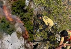 Orman işçileri, alevlerden son anda kurtuldu