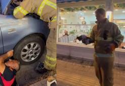 Otomobilin motoruna sıkışan yavru kedi kurtarıldı