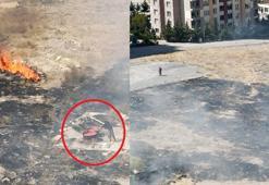 Alevlere rağmen salça karıştırmaya devam etti