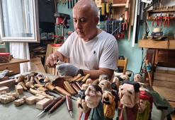 İnternetten yapmayı öğrendiği ahşap el yontması figürleri, festivallerde sergiliyor