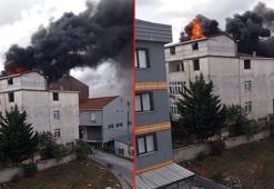 Sultanbeyli'de kentsel dönüşüm için boşaltılan binanın çatısı alev alev yandı