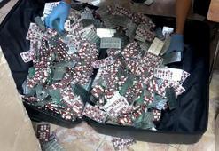 Üst aramalarında 167, çıktıkları evde 10 bin 386 uyuşturucu hap ele geçirildi