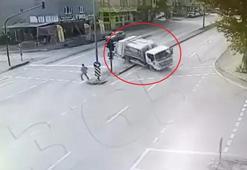 Devrilen çöp kamyonunun altında kalmaktan son anda kurtuldu; o anlar kamerada