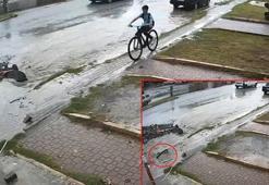 Lise öğrencisi, bisikletiyle yağmur suyu dolu çukura düştü