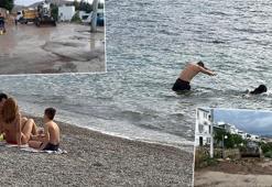 Bodrum'da sağanağa rağmen turistler denize girdi