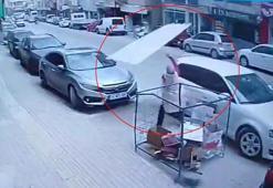 Çatıdan uçan sacın altında kalmaktan son anda kurtuldu
