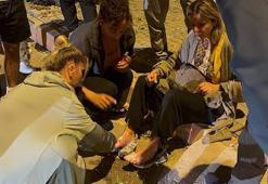 Yangında ayakları yanan kadın ile kedisine, komşuları yanık kremiyle müdahale etti