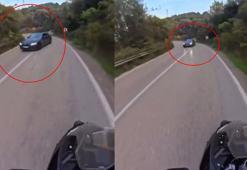 Otomobil sürücüsü virajda drift attı, motosikletli kazayı kıl payı atlattı