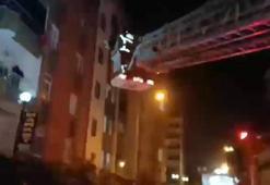 Yanan evin balkonunda mahsur kalan çocuk, kurtarıldı