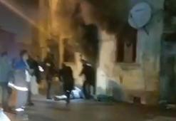 2 katlı ahşap evdeki yangında alevlerin arasından yaralı çıktı