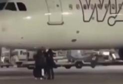 Almanya'da uçağı kaçıran yolcular piste koştu