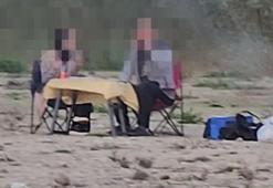 Sapanca Gölü'ndeki kuraklığa, ‘Suyun olduğu yerde insanlar mangal yapıyor’ görseliyle dikkat çekti