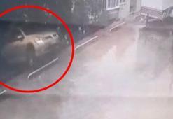 Otomobilini yanlışlıkla geri vitese alınca, 7 metre yükseklikten düştü; kaza anı kamerada
