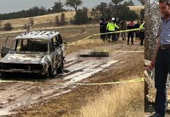 Yanmış otomobilin yanında bulunan cesedin, kayıp başı aranıyor