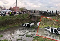 Dere yatağına yuvarlanan otomobildeki 3 kişi yaralandı