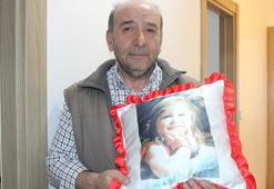 Depremde enkazdan sadece kızının çocukluk fotoğrafını kurtarabilen aile, yeni evlerinde