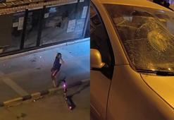 Taşla park halindeki otomobiller ile iş yerlerinin camlarını kırdı