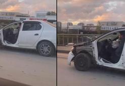 Başakşehir'de kapısı olmayan otomobille trafikte seyreden sürücü kamerada