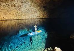 Şahika Ercümen’in de daldığı Aynalıgöl Mağarası, bu yıl 60 bin ziyaretçiyi ağırladı